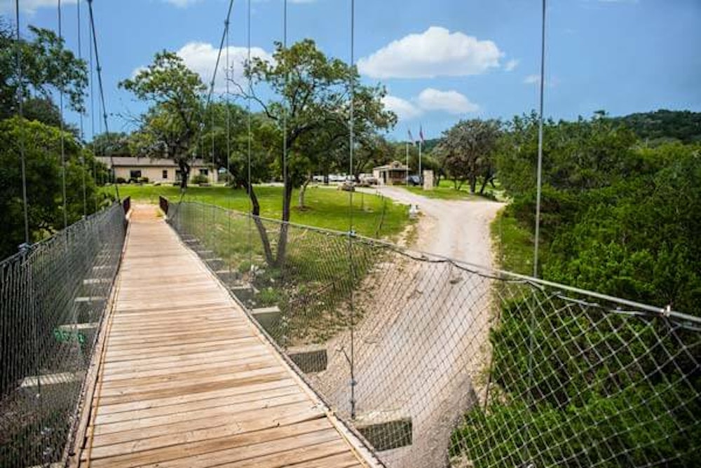 Experience a new perspective of camp as you walk across the suspension bridge.