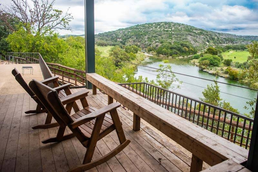 Long day? Kick your feet up, rock away and enjoy the Hill Country view.